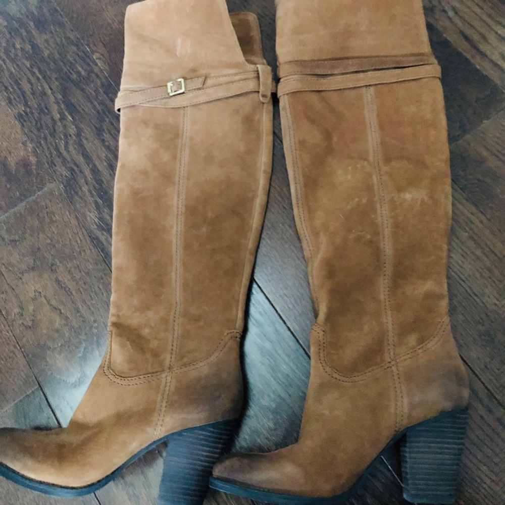 Never worn . Luggage both over knee/or knee boot